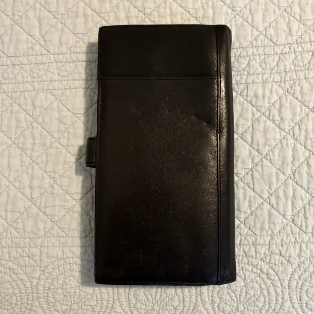 Tumi travel wallet passport card organizer.